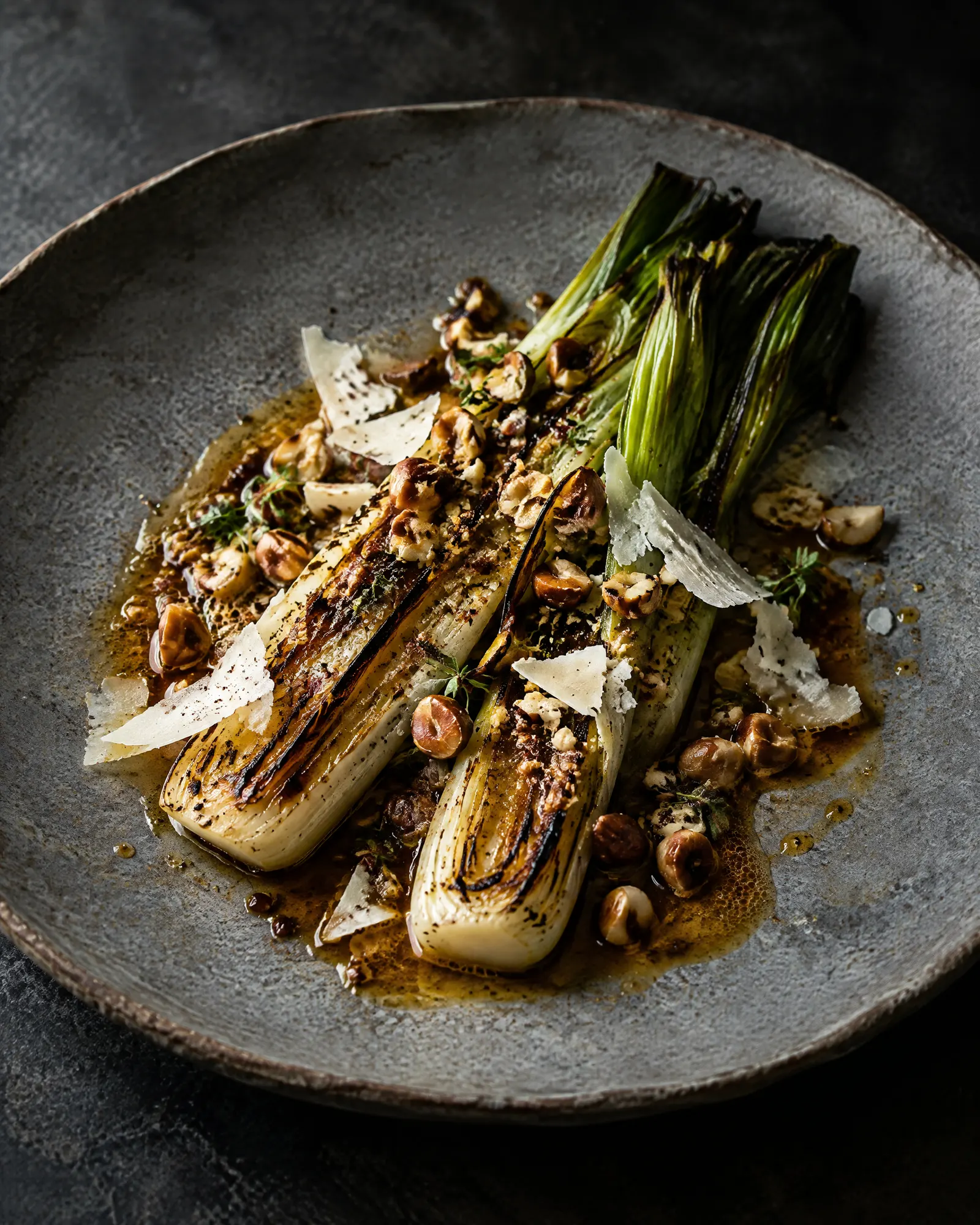 Charred leeks, hazelnut, aged goat cheese